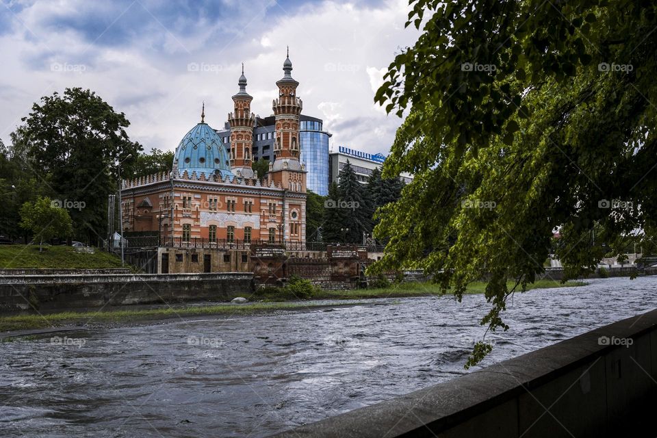 Mosque on river . dramatic light