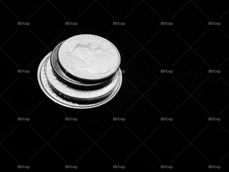 Stacked United States Coins in Black and White.