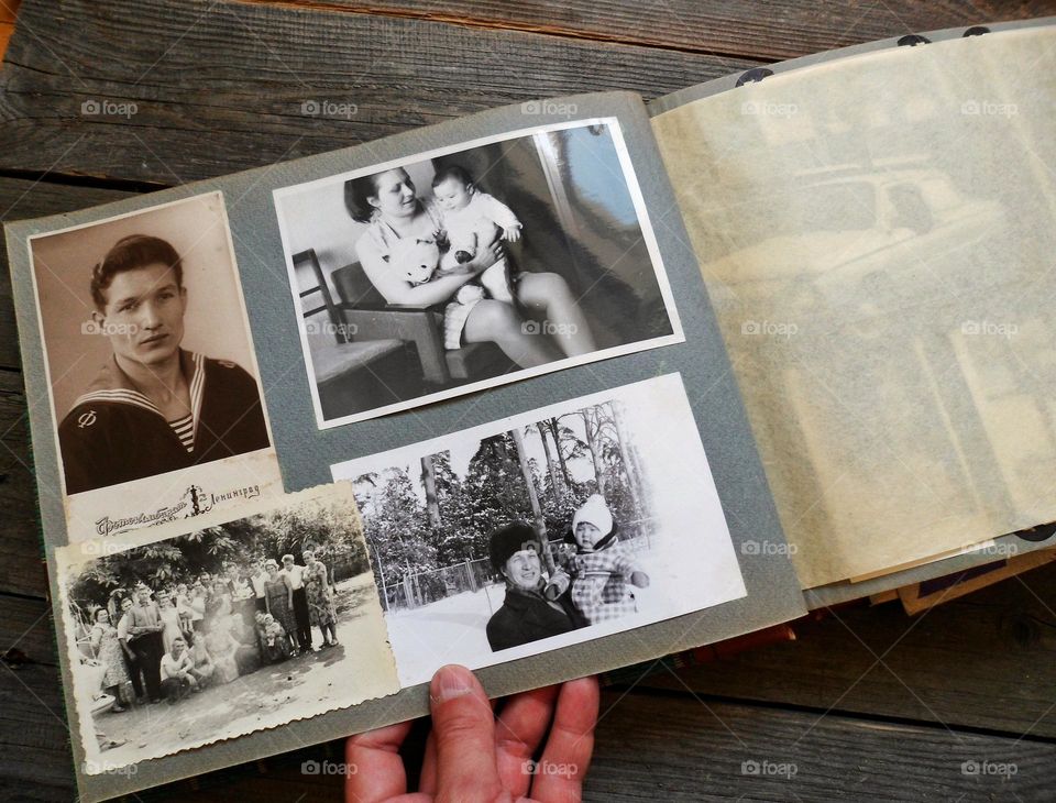 old family album with old black and white photographs