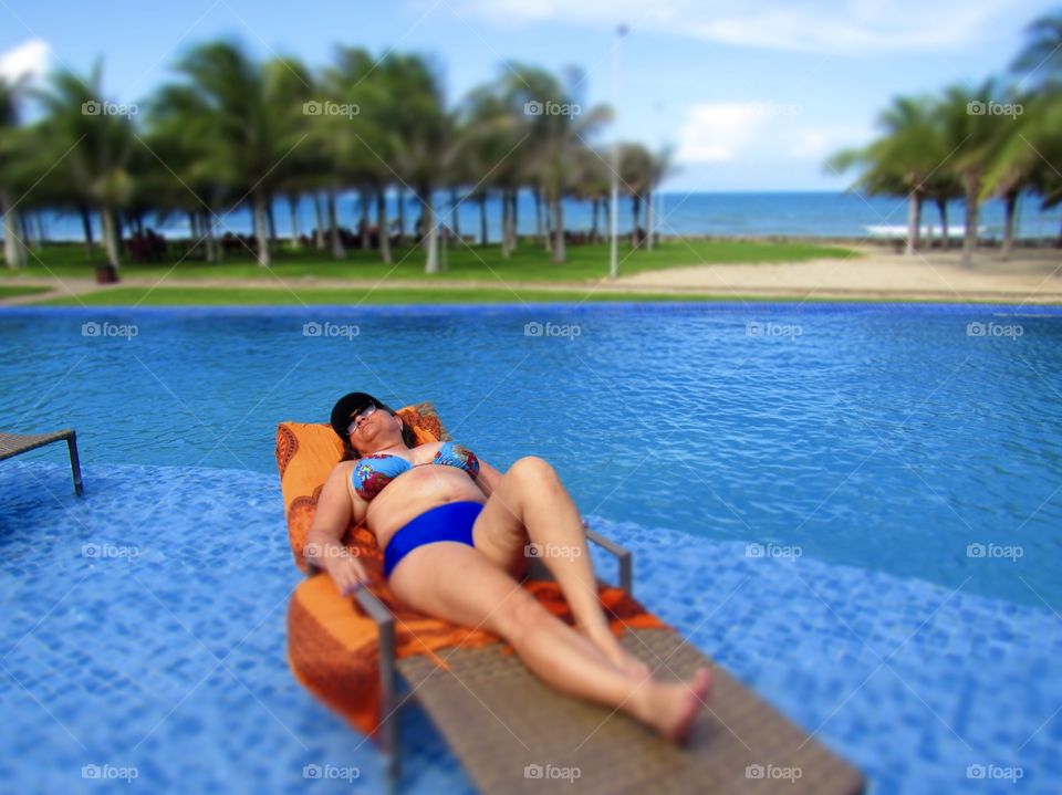 Woman relaxing in the pool