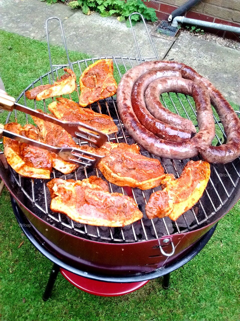 barbecue with sausage and lamb chops