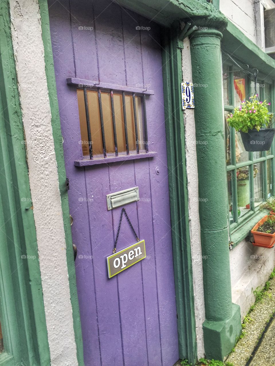Purple door. A pretty purple shop door