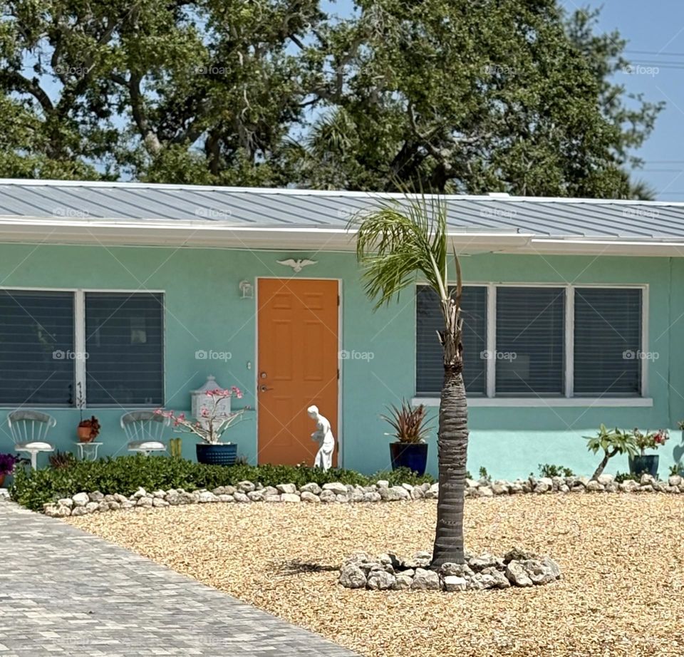 Tangerine Door on an Aqua House