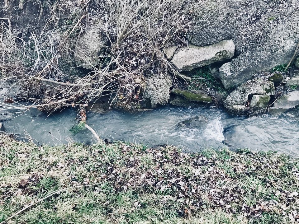 Rushing water in the neighborhood stream. 
