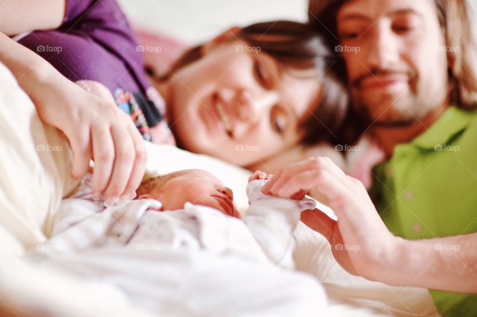 New born baby with parents