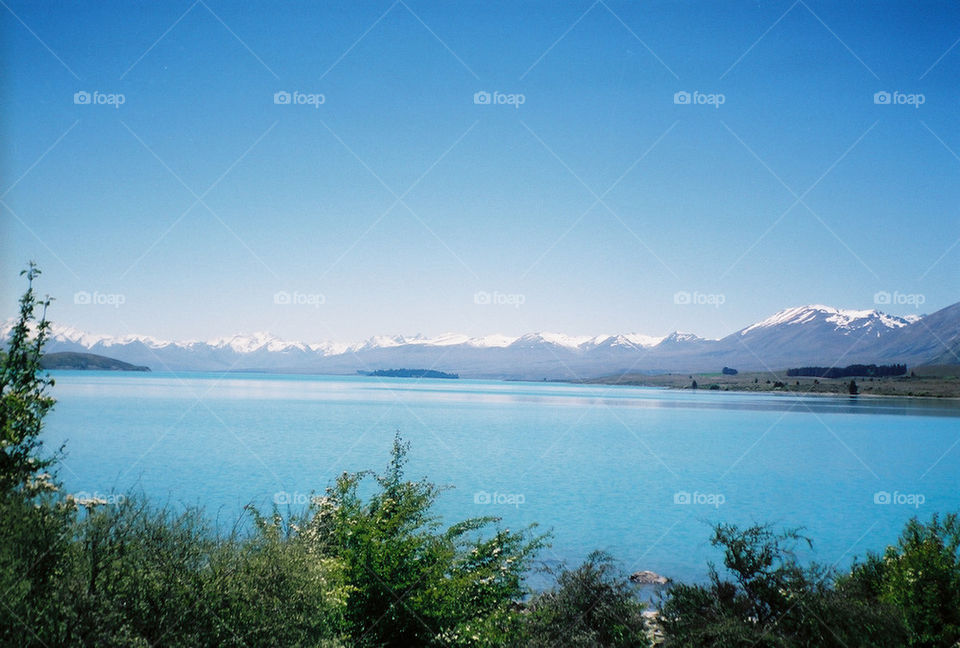 blue water lake mountains by jgren12