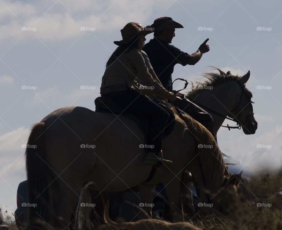 riders at sunset