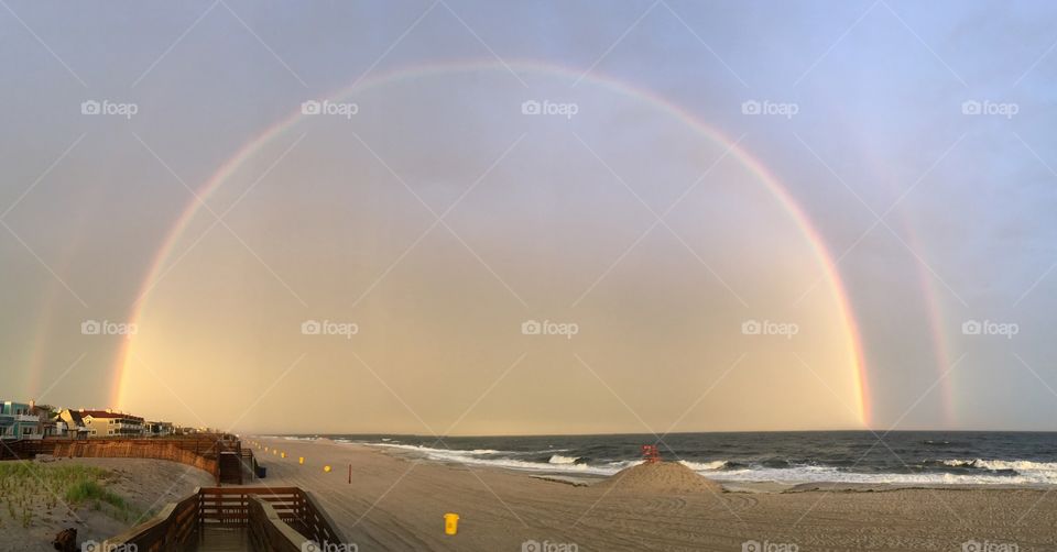 Double rainbow over the beach
