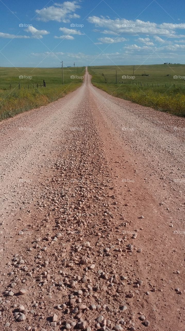 View of empty dirt road