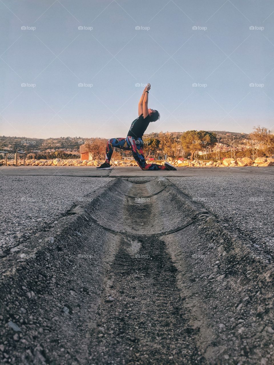 Young woman doing yoga outdoor.