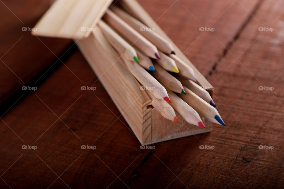 Wood pencils table on a wooden table