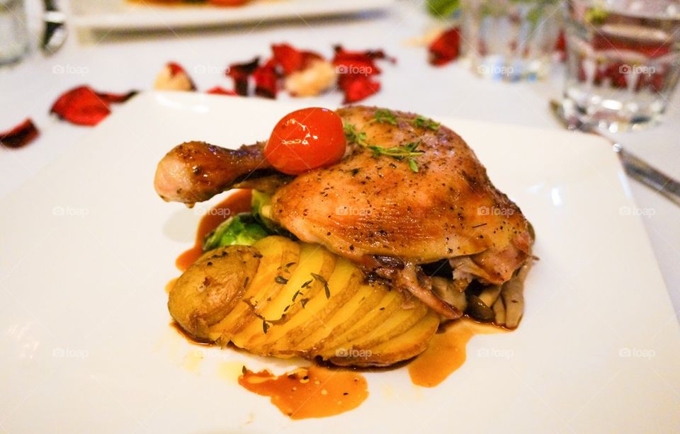 Roasted chicken with potatoes and mushrooms