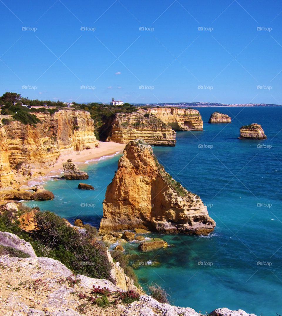 beach ocean sun cliffs by ponchokid