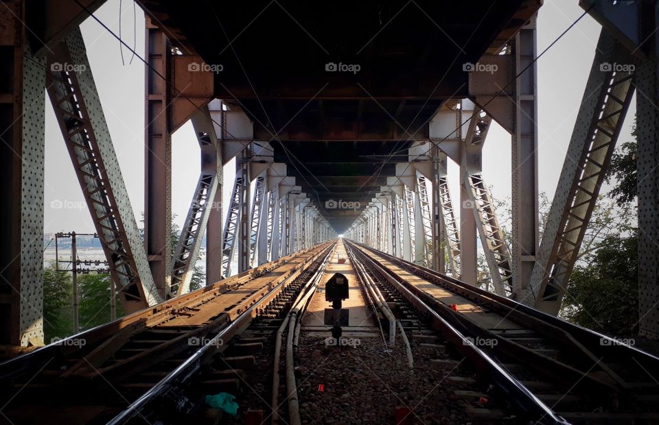 endless railway track under the bridge inside Varanasi. this morning I was walking around inside a Varanasi and I want a Kashi station and took this picture of railway track