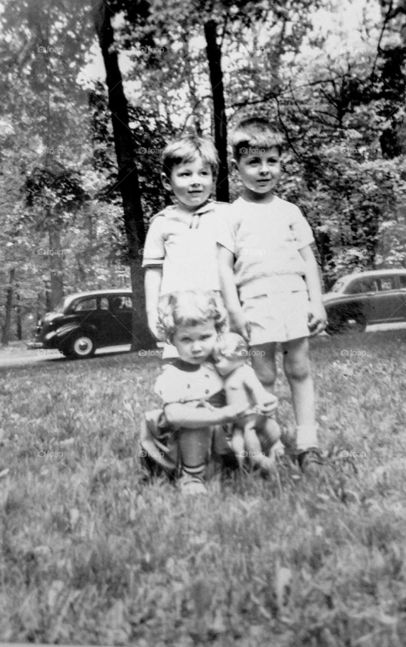Crabby Baby Girl with Doll and Brother May 1953 Memorial Week End