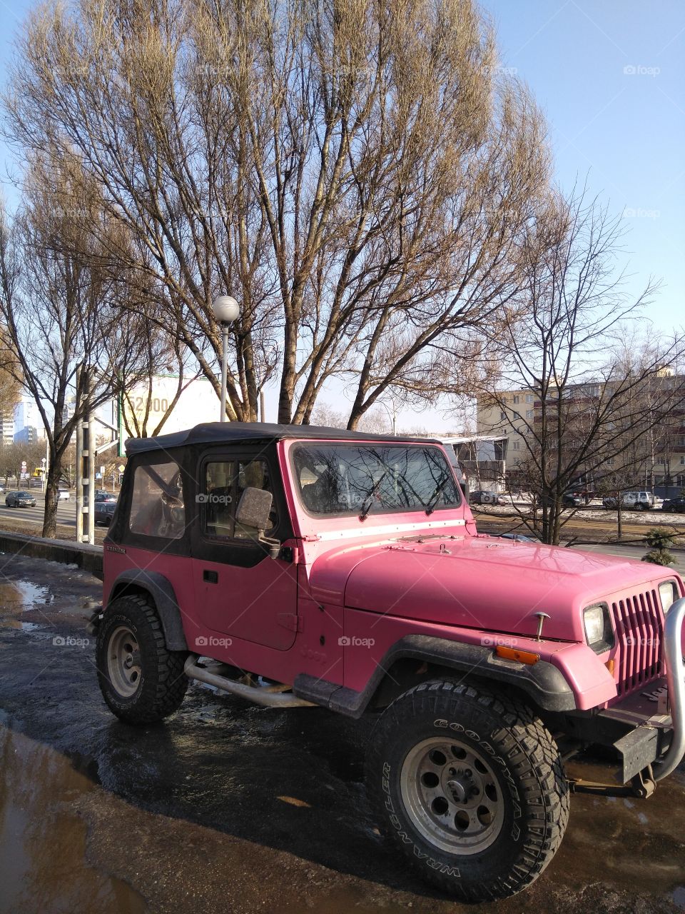 pink car in a street