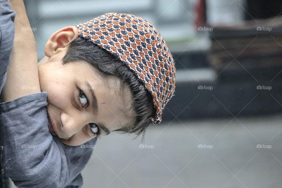 I'm not a terrorist, maybe his eyes full of fears want to say to the world, his smile which he's hiding because of fear from us is something through which he can become friend of ours, but because of terrorist all my Muslim brothers are facing hatred