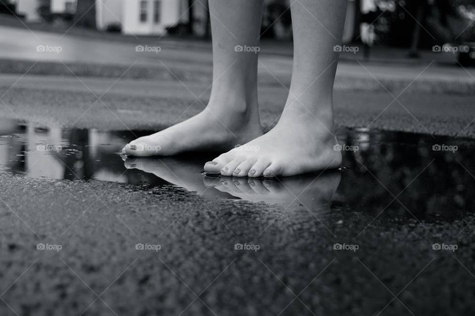 Feet in a puddle