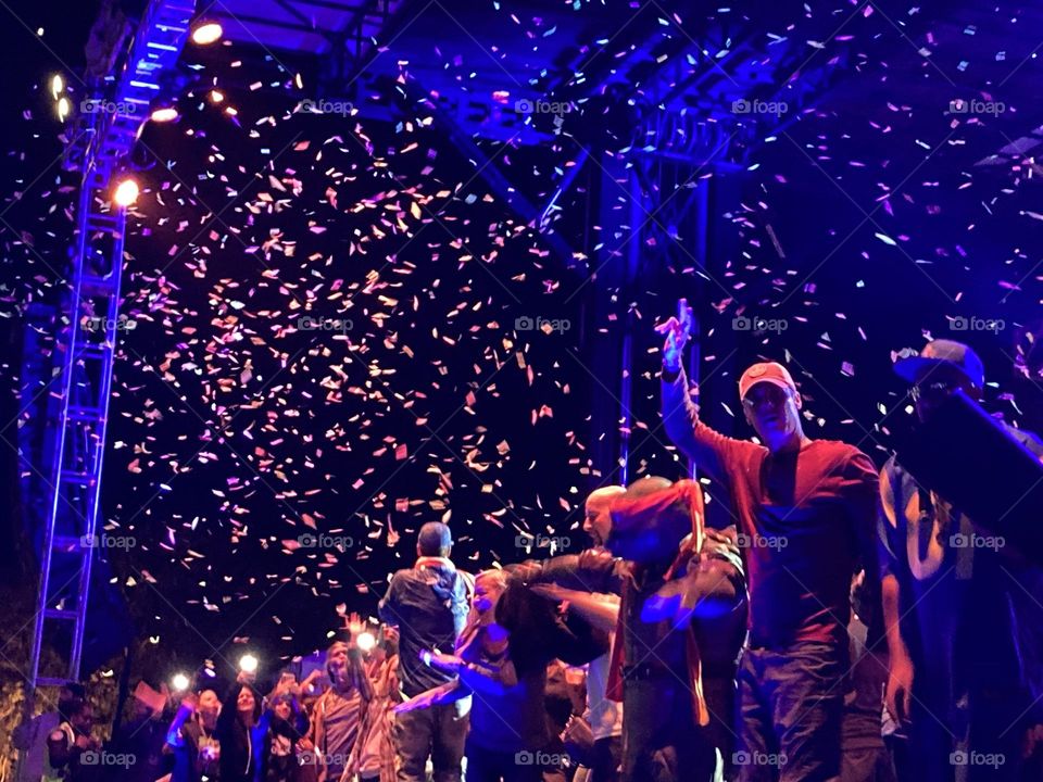 Crowd photography at a concert with confetti 🎉