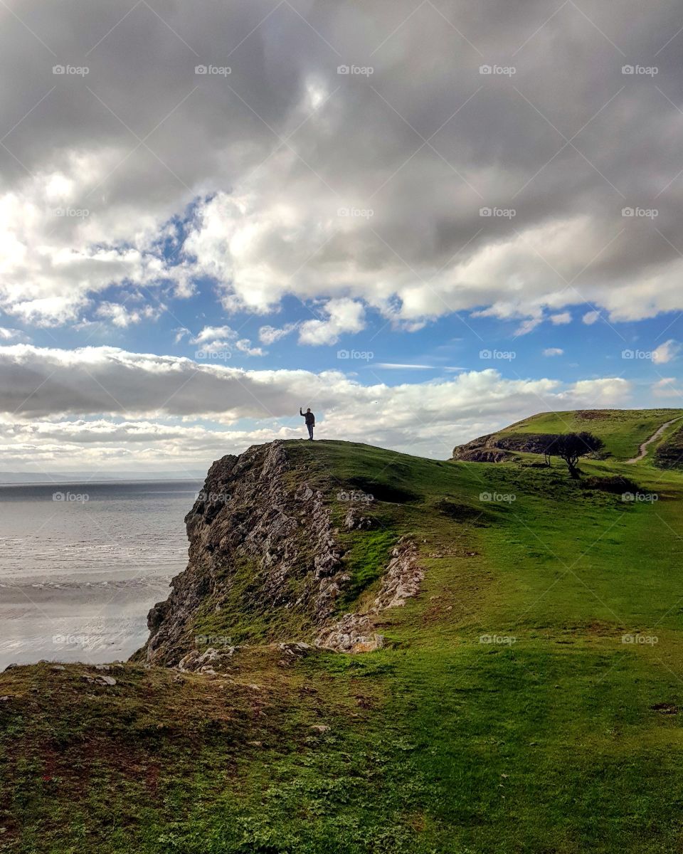standing at the edge of the cliff Brean Down Somerset