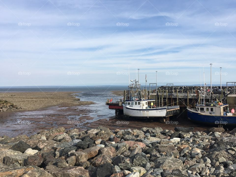 Boats docked in the Bay of Fundy, Alma NB 