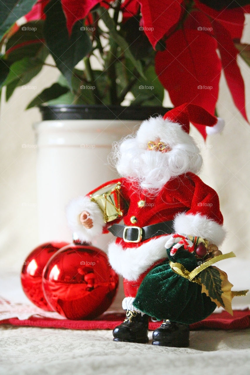 Santa Clause and balls and poinsettia 