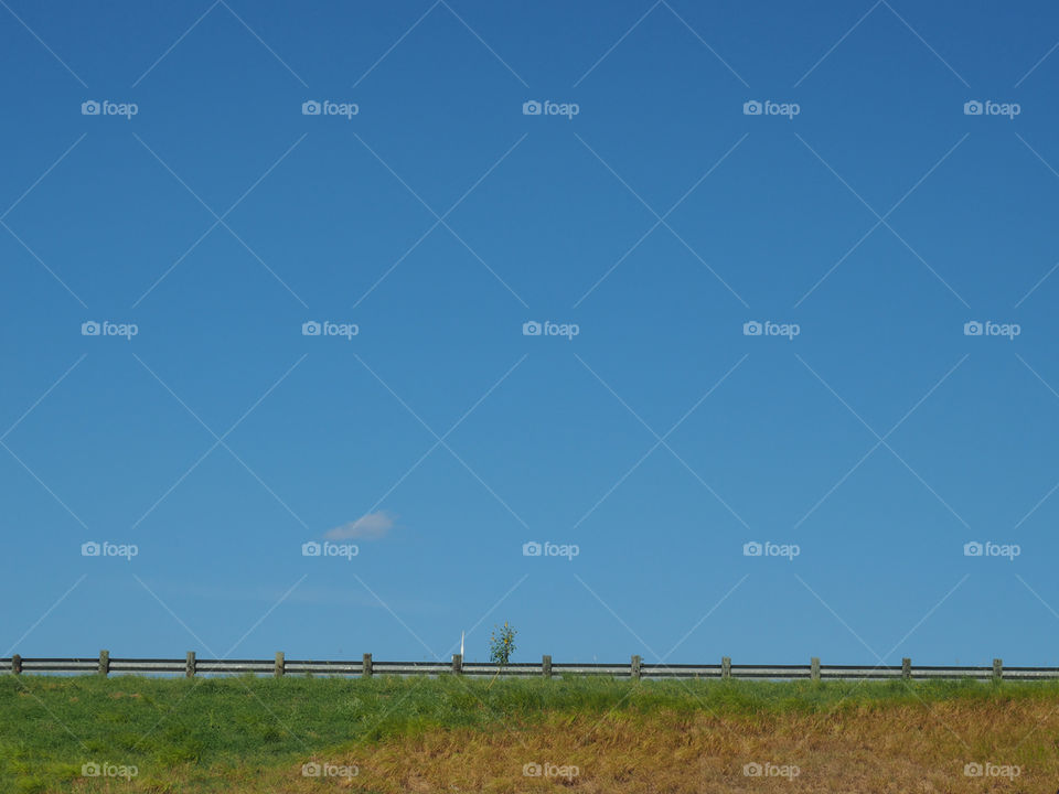 Minimalistic roadside scene. Roadside minimal roadtrip landscape sunny summer scene lonely isolated trip transportation