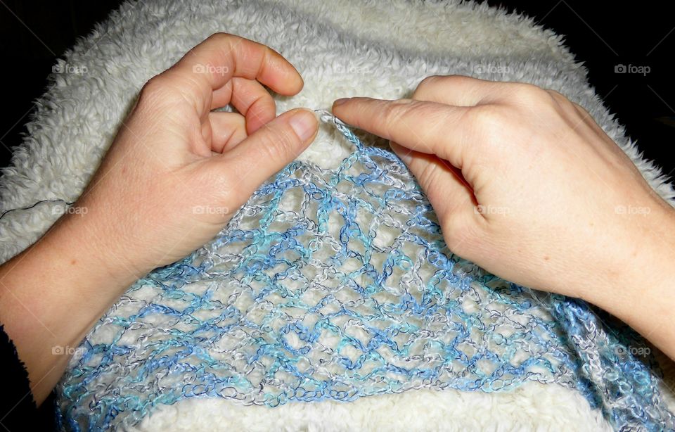 Close-up of hand crocheting