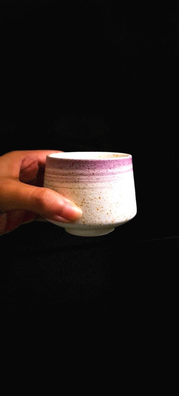Holding a cup