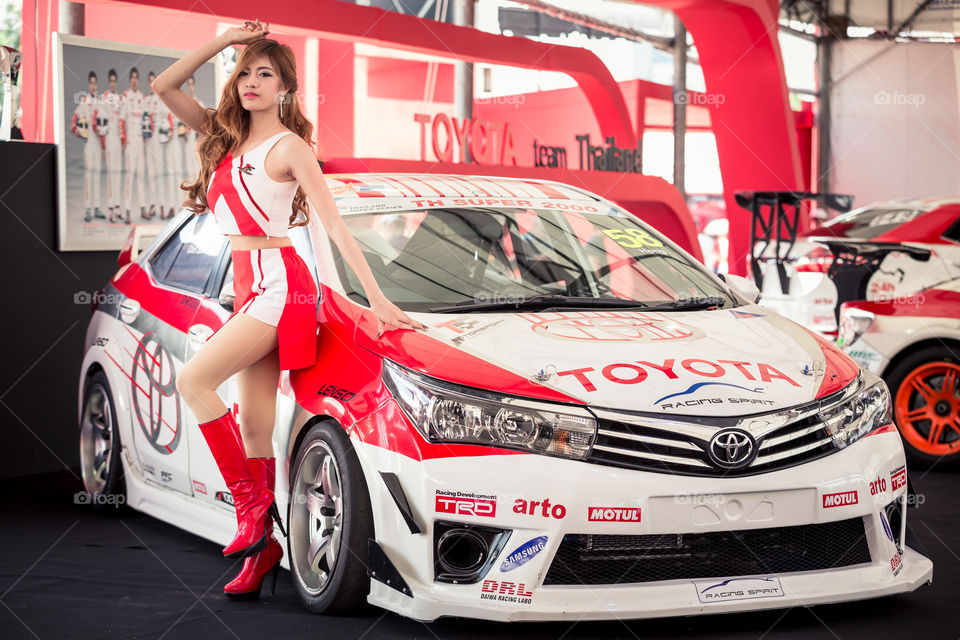 Racing girl with racing car 