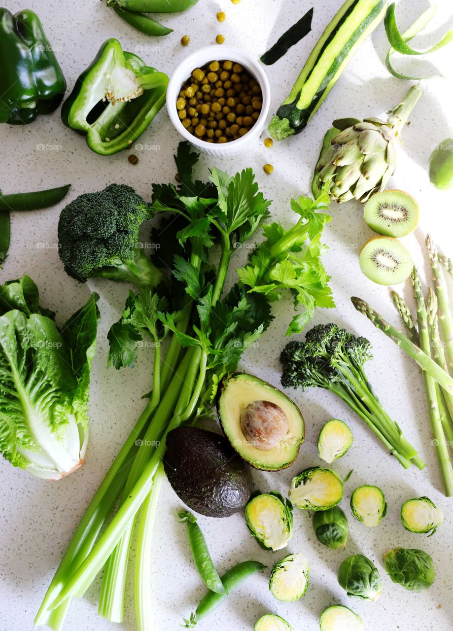 green vegetables on kitchen table