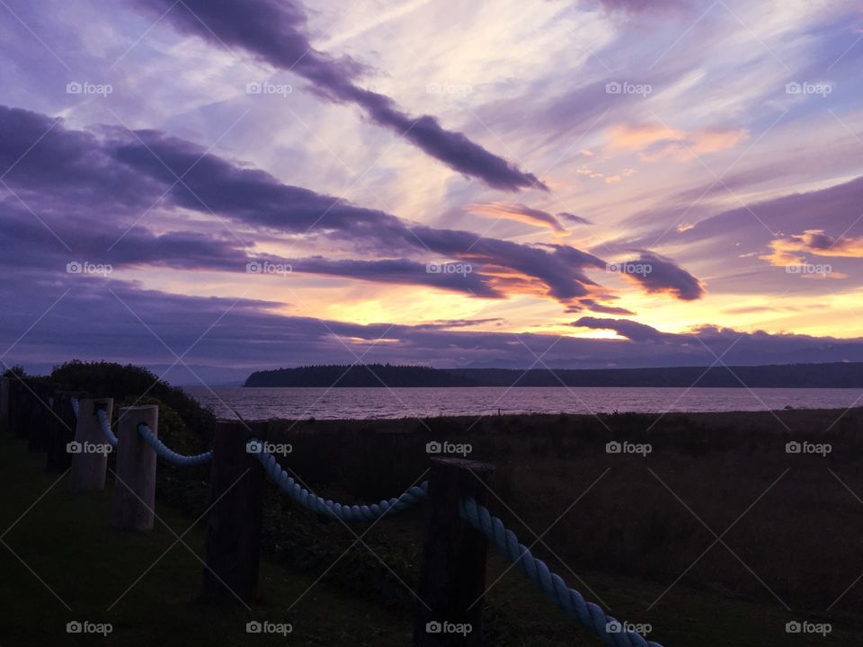 Railing at sea during dusk