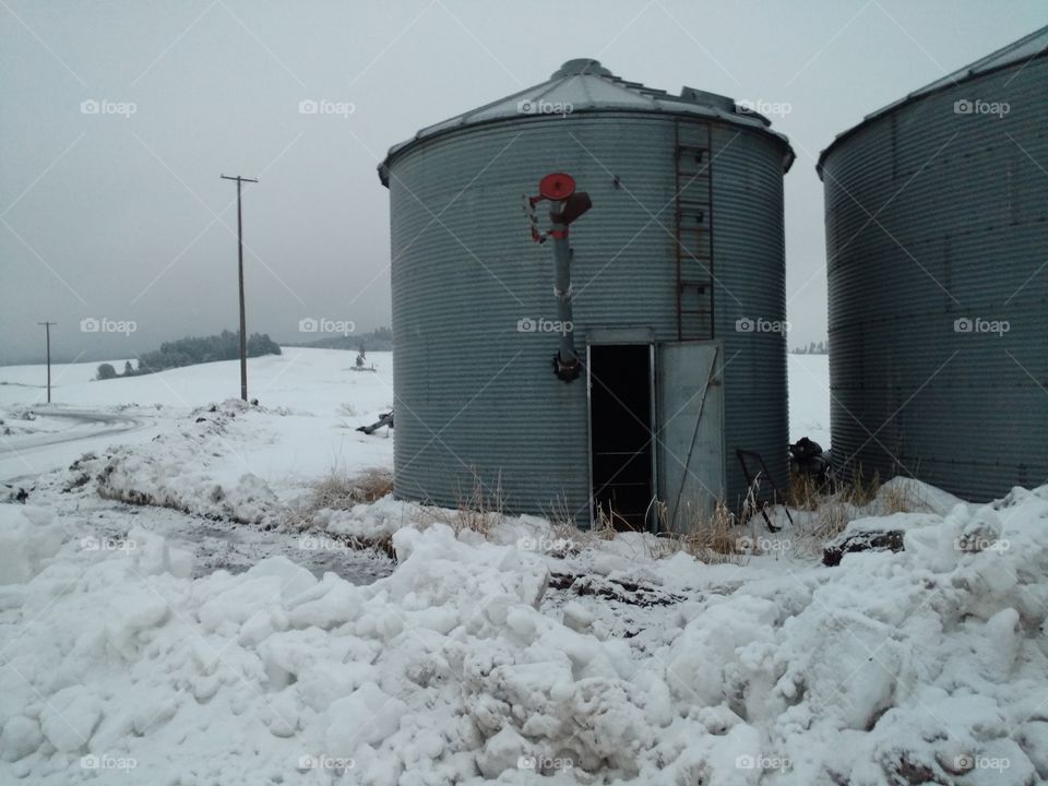 grain bin in a snowy place