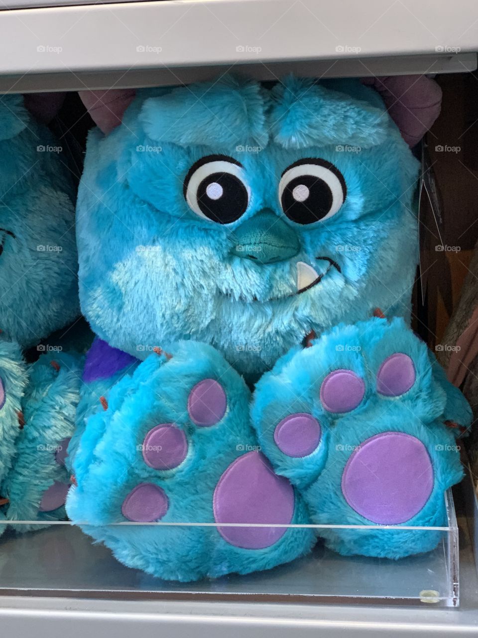 Cute fluffy stuffed blue monster