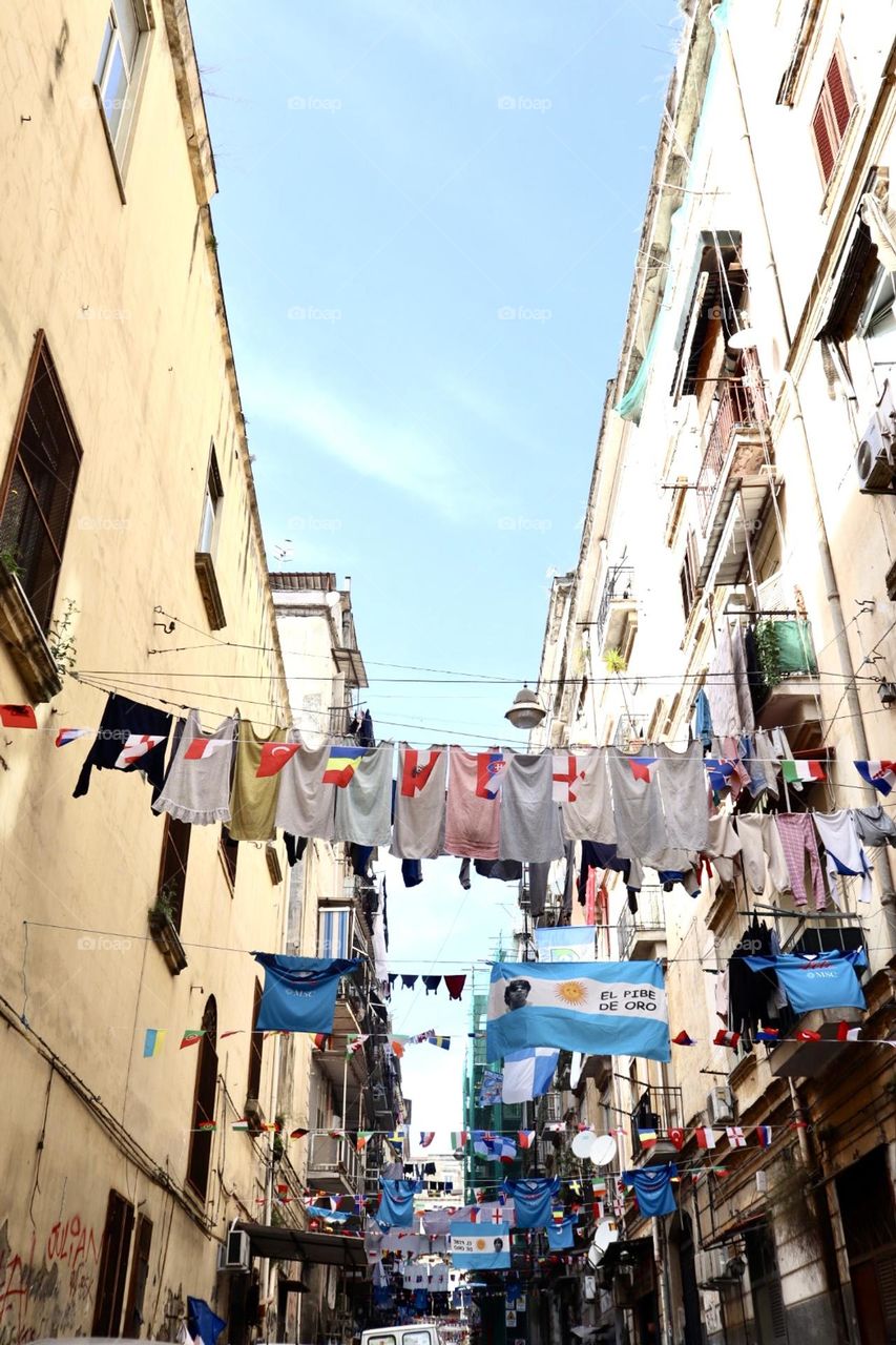 Laundry and flags in Napoli streets