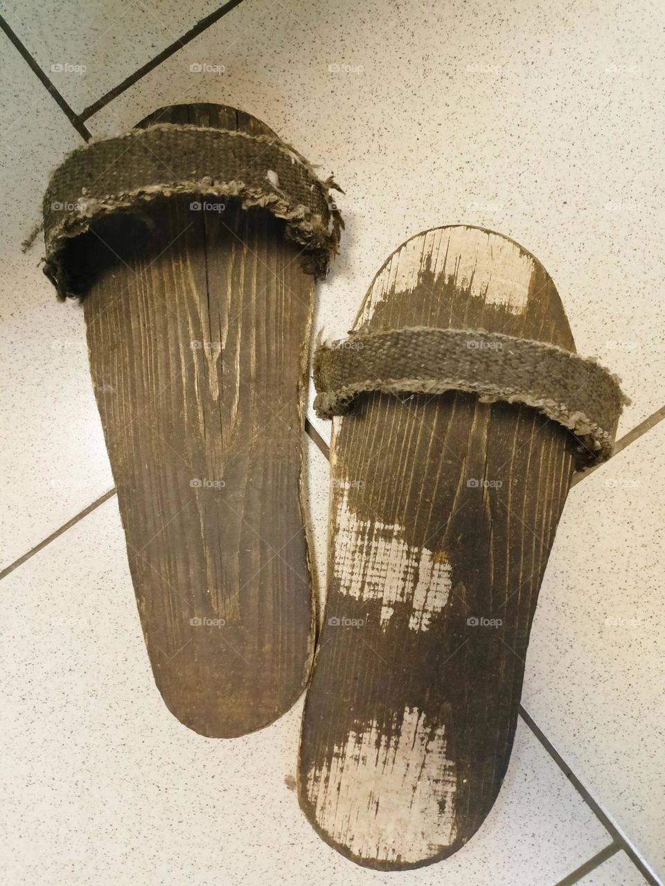 wooden flip flops are the latest fashion, wear with pleasure at least 200 years. wooden shoes, working blocks.