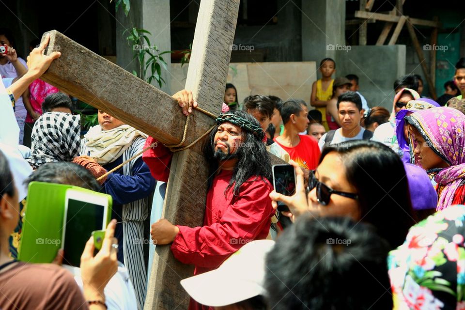 catholic devotees reenact the death of jesus christ on good friday during holy week in cainta, rizal, philippines, asia