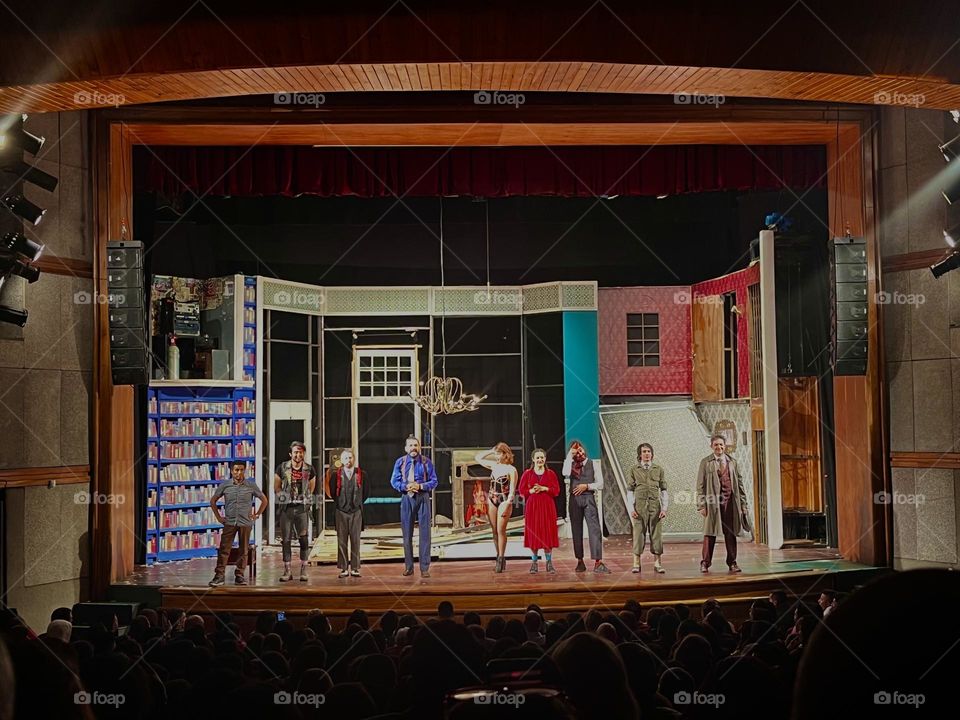 Enjoying a play in the theater 