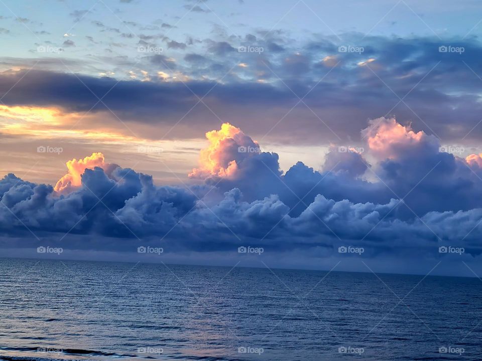 Majestic clouds and view of the Beach