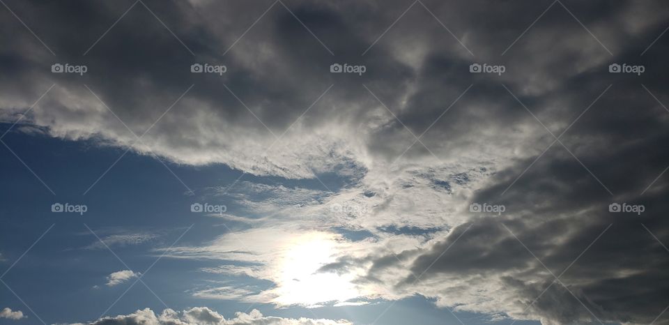 shining through the clouds