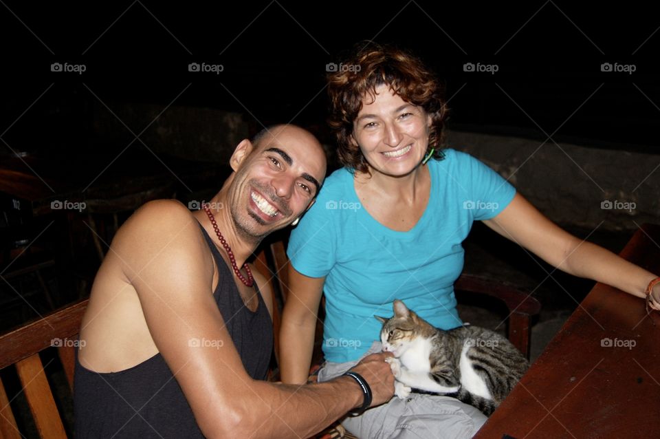 Cat sitting on woman 