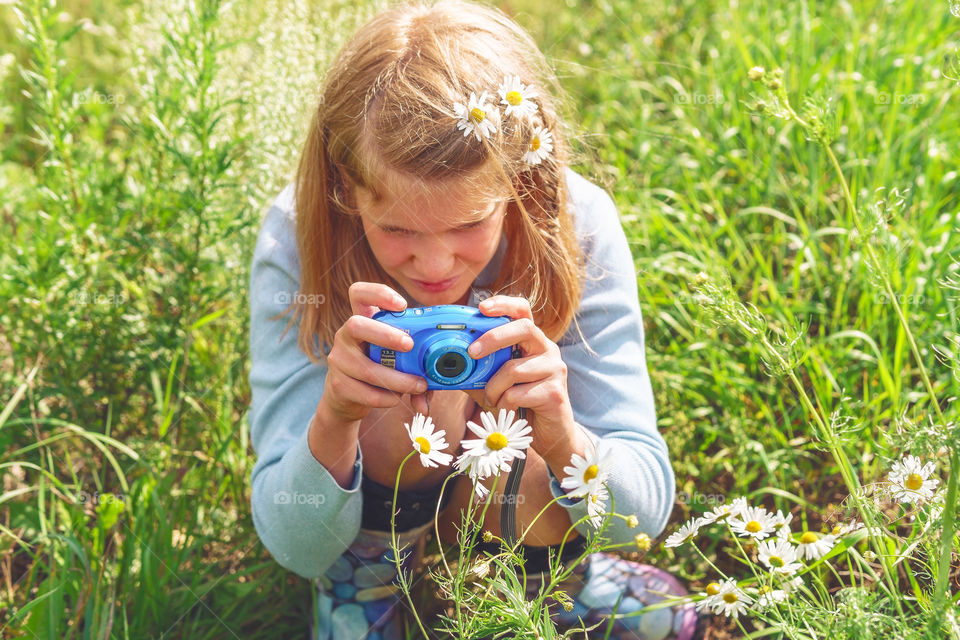 Little photographer is taking photo