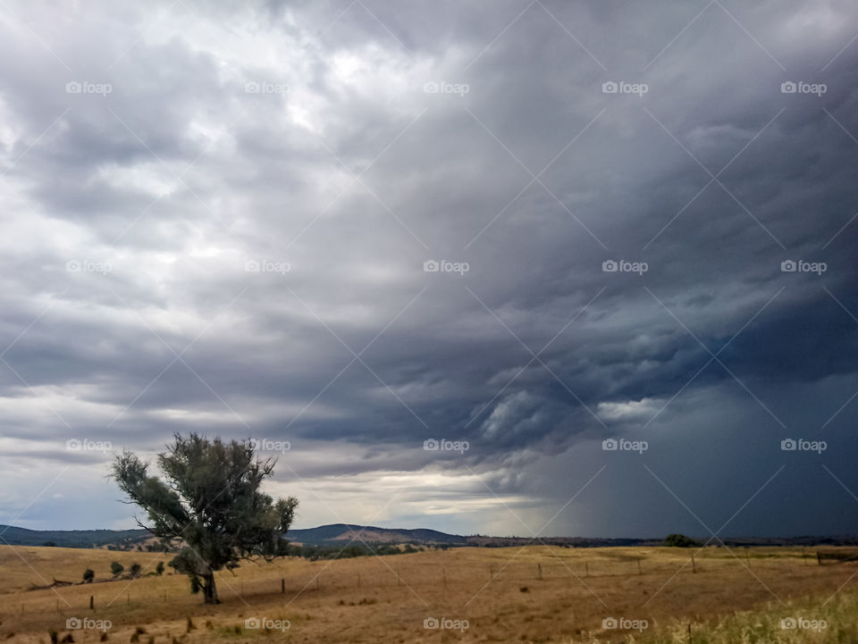 View of storm clouds over the land