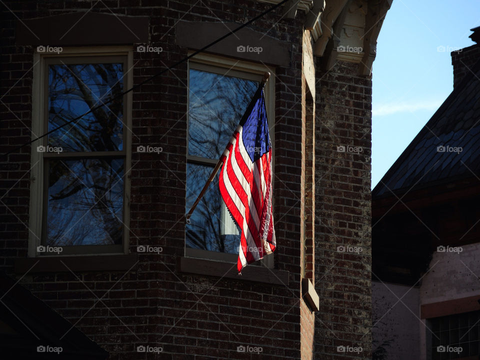 blue red white building by delvec