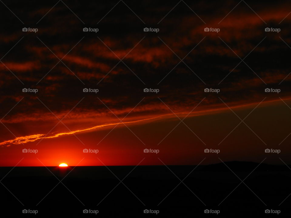 Scenic view of sunset over sea