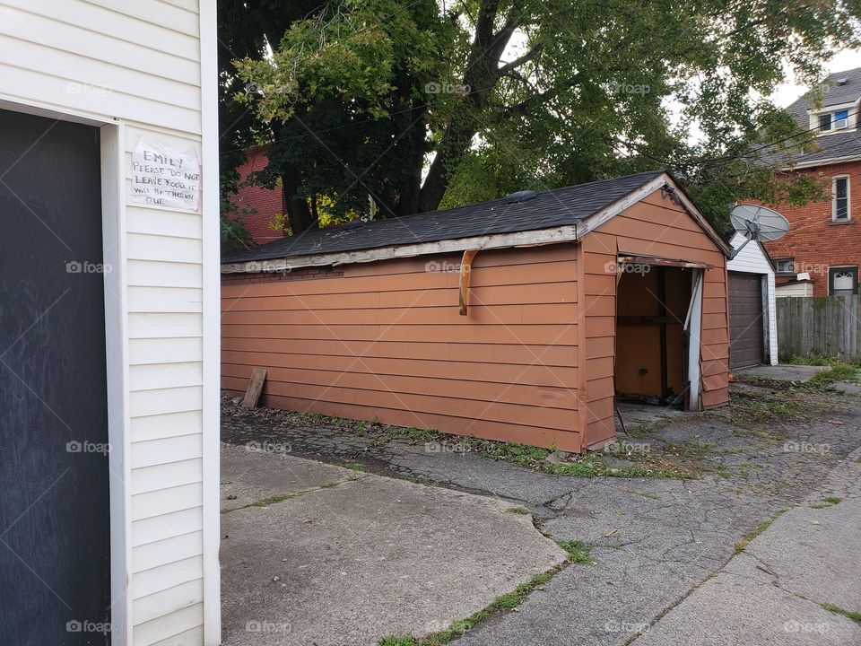 old garage in an alleyway in an old neighborhood of the city