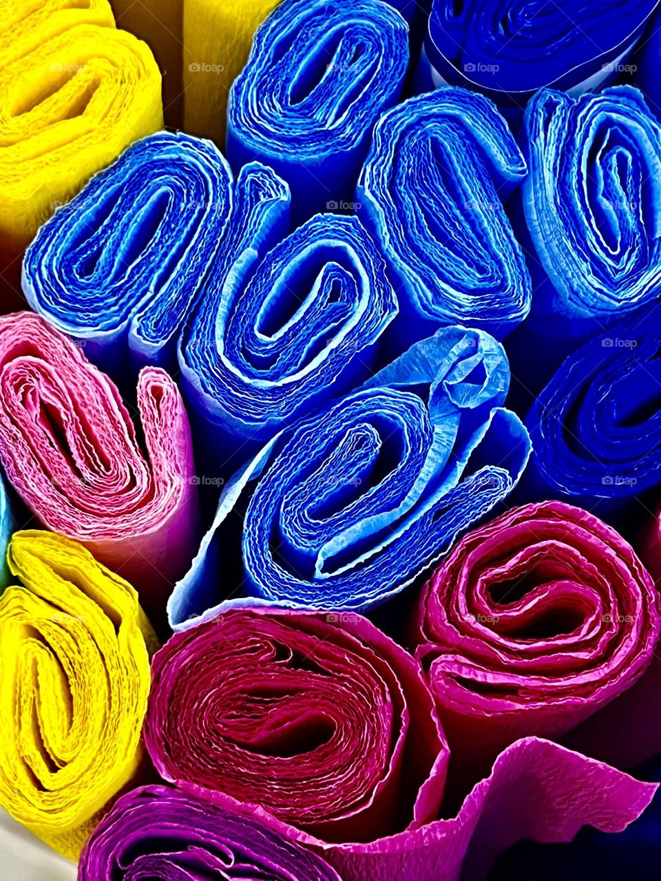 Rolls of multi-colored paper. Abstraction. Background