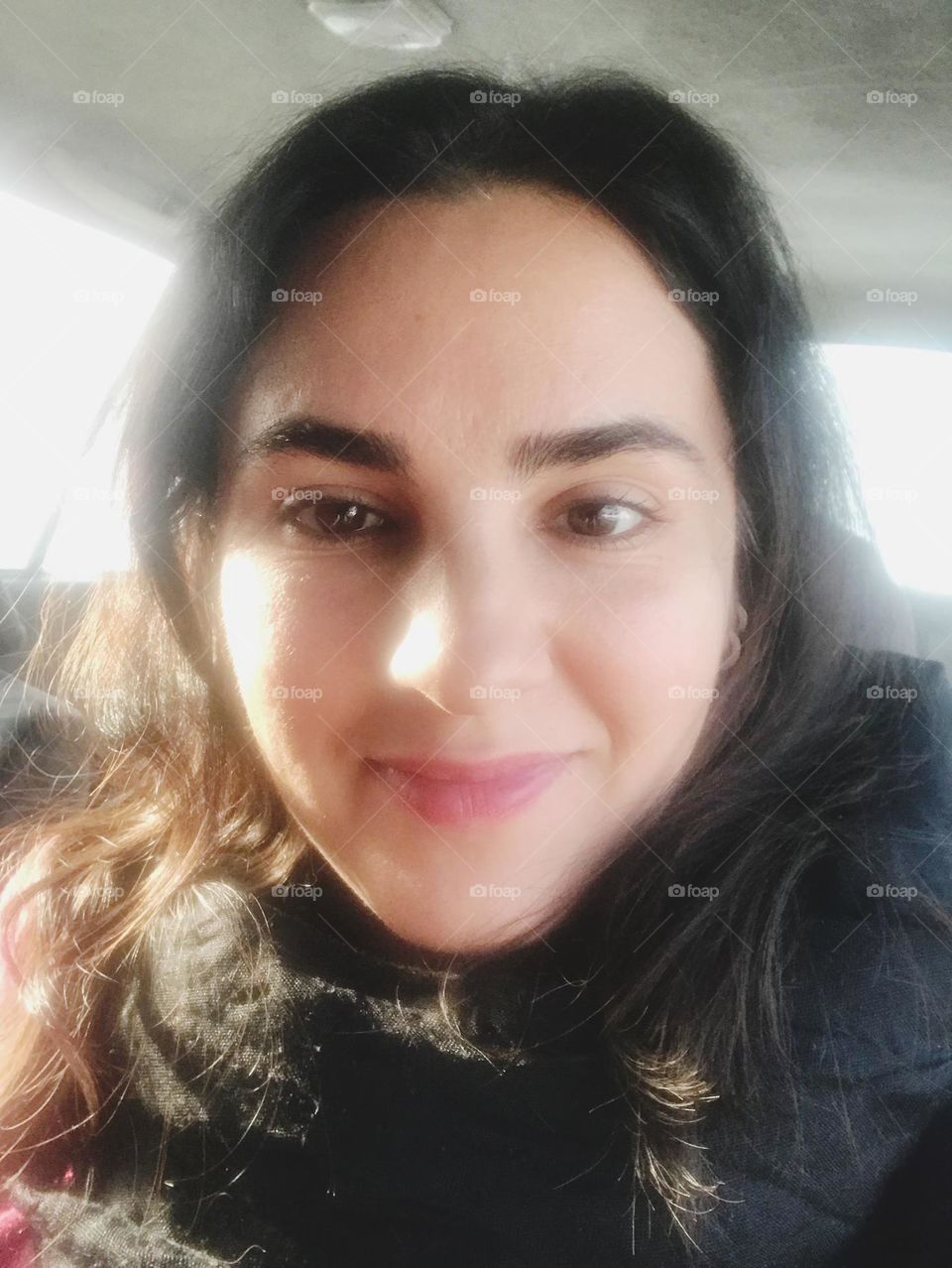 Happy girl in the car