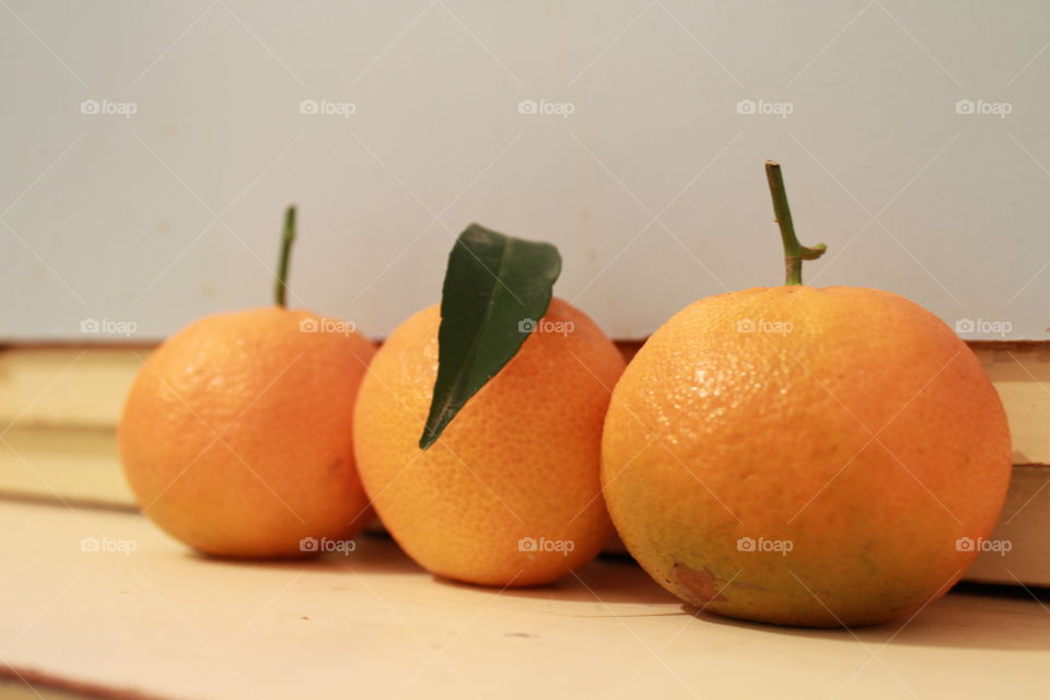 three orange Mandarin