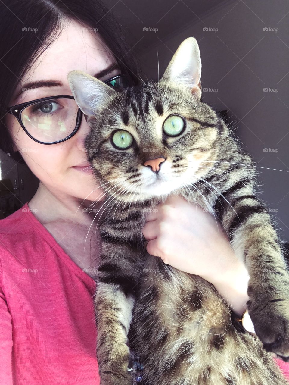 Beautiful girl with cute cat. Portrait